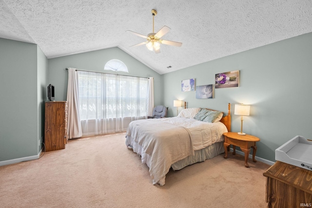 210 N Brookfield Dr, Lafayette, IN 47905 - bedroom featuring light colored carpet, lofted ceiling, a textured ceiling, and a ceiling fan