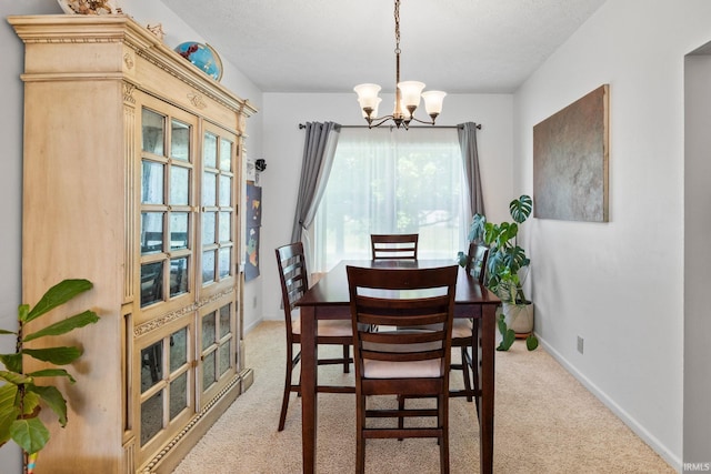 210 N Brookfield Dr, Lafayette, IN 47905 - dining space featuring a chandelier and light colored carpet