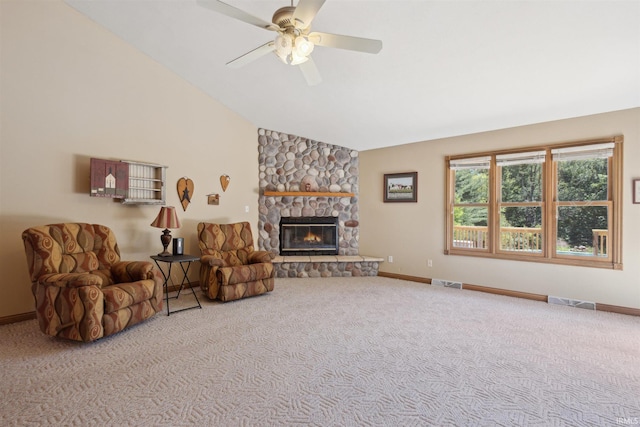 5171 N 350 E, Rolling Prairie, IN 46371 - living area featuring carpet floors, a fireplace, a ceiling fan, and high vaulted ceiling