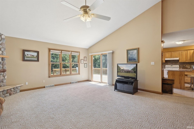 5171 N 350 E, Rolling Prairie, IN 46371 - living room featuring high vaulted ceiling, light colored carpet, and a ceiling fan