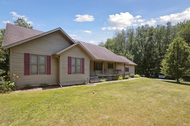 5171 N 350 E, Rolling Prairie, IN 46371 - single story home with a porch, a front lawn, and roof with shingles