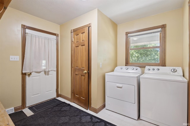5171 N 350 E, Rolling Prairie, IN 46371 - laundry room featuring washing machine and clothes dryer and baseboards