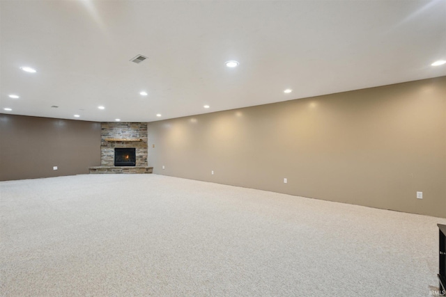 5171 N 350 E, Rolling Prairie, IN 46371 - unfurnished living room with carpet, recessed lighting, and a stone fireplace