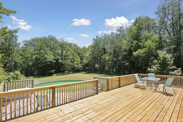 5171 N 350 E, Rolling Prairie, IN 46371 - wooden terrace featuring a yard, an outdoor pool, and outdoor dining area