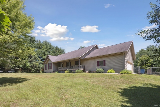 5171 N 350 E, Rolling Prairie, IN 46371 - rear view of property with a garage and a porch