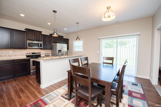 1860 Sandpiper Dr, West Lafayette, IN 47906 - dining area featuring wood finished floors and recessed lighting