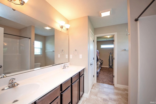 1860 Sandpiper Dr, West Lafayette, IN 47906 - bathroom with double vanity and baseboards