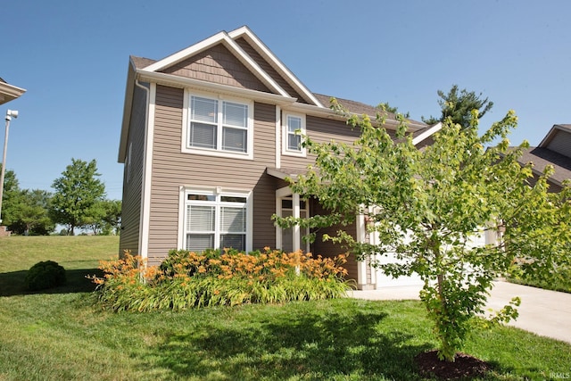 1860 Sandpiper Dr, West Lafayette, IN 47906 - view of front of property with a front lawn, concrete driveway, and an attached garage