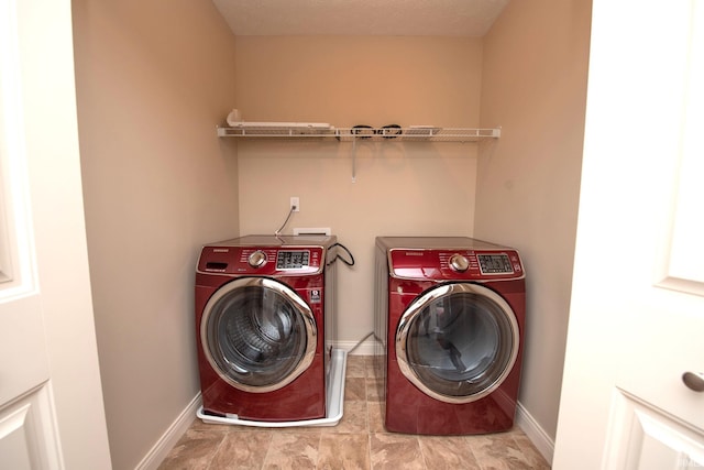 1860 Sandpiper Dr, West Lafayette, IN 47906 - washroom with separate washer and dryer and baseboards