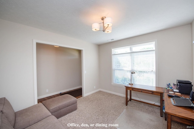 1860 Sandpiper Dr, West Lafayette, IN 47906 - carpeted office space with a chandelier and baseboards
