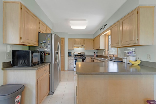 9502 Sail Wind Dr, Fort Wayne, IN 46804 - kitchen with stainless steel gas stove, light brown cabinetry, and black microwave