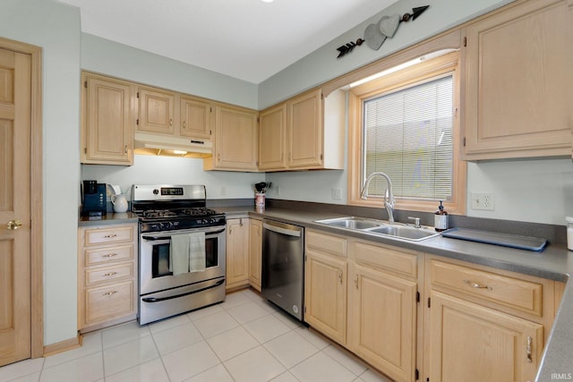 9502 Sail Wind Dr, Fort Wayne, IN 46804 - kitchen featuring appliances with stainless steel finishes, under cabinet range hood, light brown cabinetry, and light tile patterned floors
