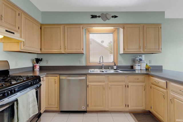 9502 Sail Wind Dr, Fort Wayne, IN 46804 - kitchen with appliances with stainless steel finishes, light brown cabinets, under cabinet range hood, and dark countertops