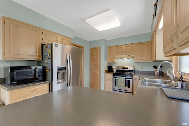 9502 Sail Wind Dr, Fort Wayne, IN 46804 - kitchen featuring appliances with stainless steel finishes, light brown cabinetry, under cabinet range hood, dark countertops, and a peninsula