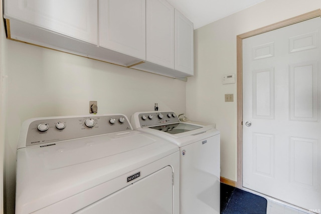 9502 Sail Wind Dr, Fort Wayne, IN 46804 - laundry area with independent washer and dryer and cabinet space