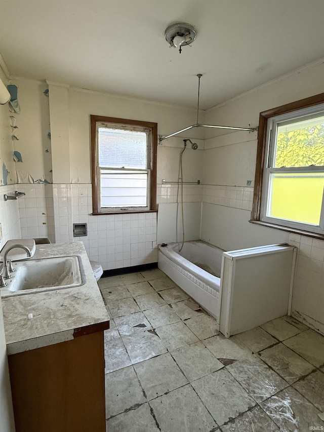 215 W 7th St, Marion, IN 46952 - full bath with tile walls, vanity, bathtub / shower combination, and tile patterned flooring