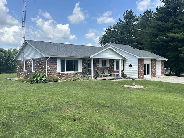 4813 N Old State Road 37, Springville, IN 47462 - ranch-style home featuring brick siding, a porch, a front yard, and a shingled roof