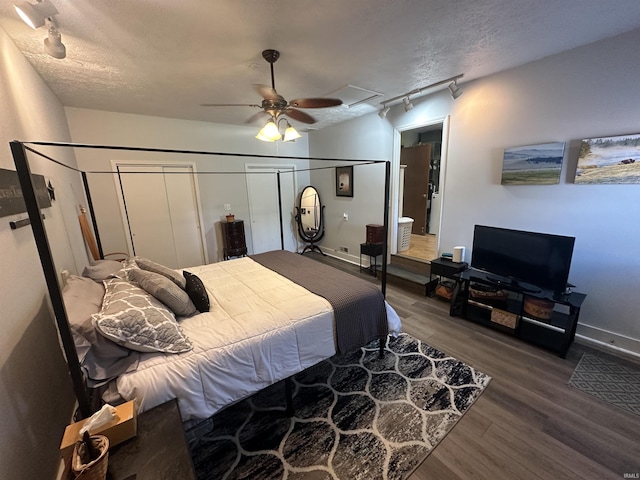 4813 N Old State Road 37, Springville, IN 47462 - bedroom with rail lighting, wood finished floors, and a ceiling fan