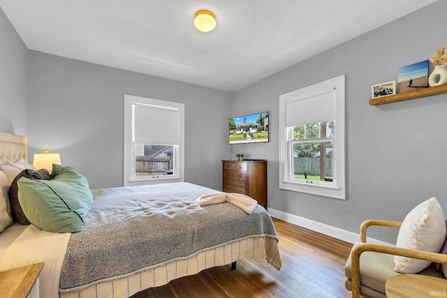 4721 Carrollton Ave, Indianapolis, IN 46205 - bedroom featuring wood finished floors and baseboards