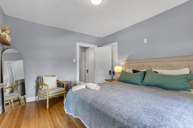 4721 Carrollton Ave, Indianapolis, IN 46205 - bedroom with wood finished floors and baseboards