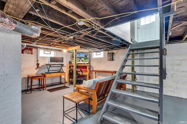 4721 Carrollton Ave, Indianapolis, IN 46205 - basement featuring stairs and plenty of natural light