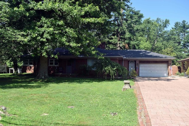 2020 N Red Bank Rd, Evansville, IN 47720 - ranch-style home featuring an attached garage, decorative driveway, and a front yard