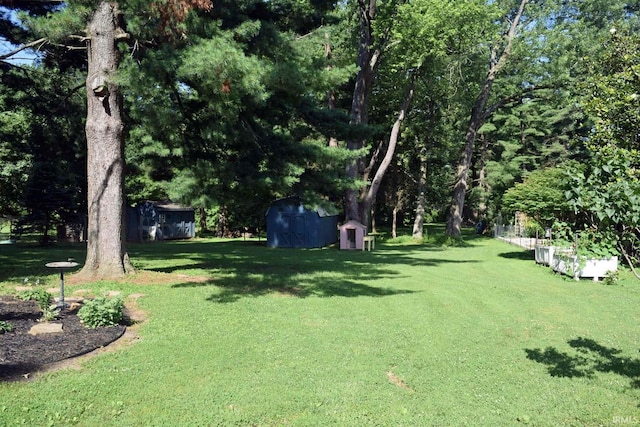 2020 N Red Bank Rd, Evansville, IN 47720 - view of grassy yard featuring a storage shed