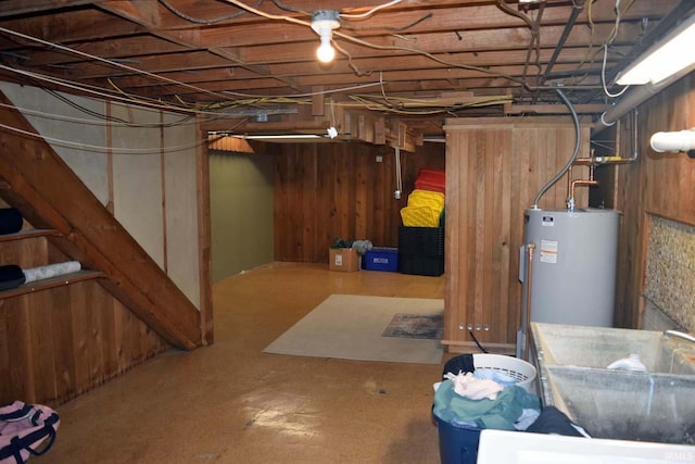 2020 N Red Bank Rd, Evansville, IN 47720 - unfinished below grade area featuring water heater and wooden walls