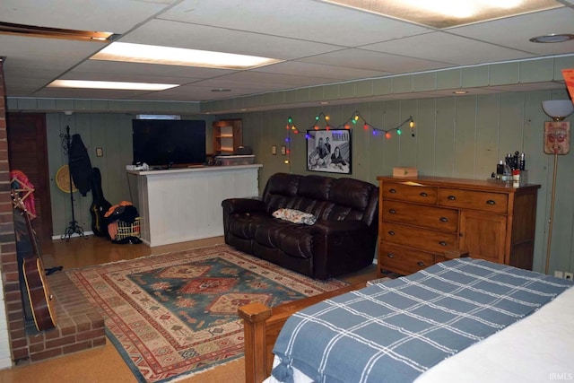 2020 N Red Bank Rd, Evansville, IN 47720 - bedroom featuring a drop ceiling and wooden walls