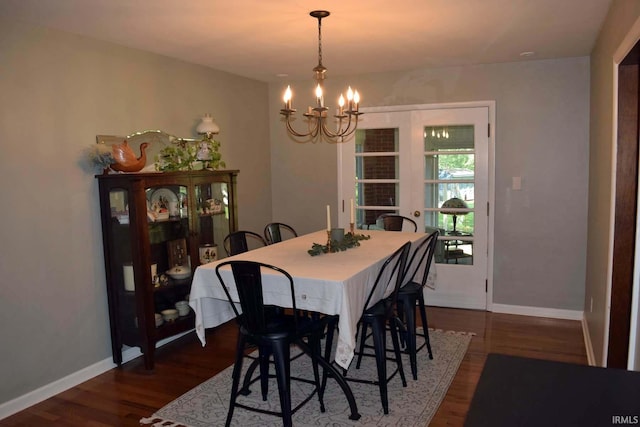 2020 N Red Bank Rd, Evansville, IN 47720 - dining area featuring a chandelier and dark wood-type flooring