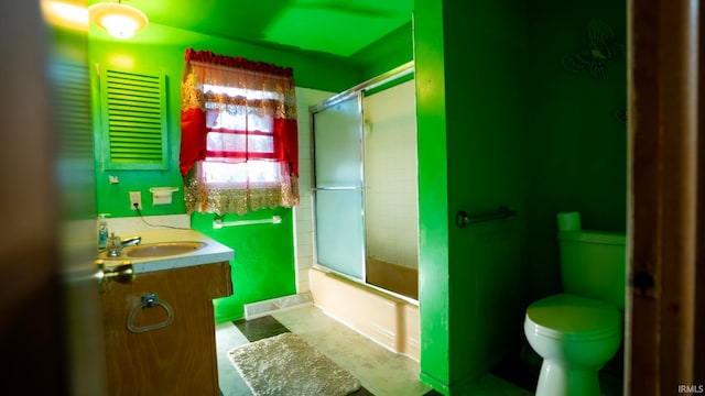 4409 Austin Dr, Fort Wayne, IN 46806 - full bath featuring vanity, enclosed tub / shower combo, and tile patterned flooring