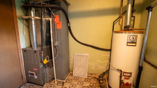 4409 Austin Dr, Fort Wayne, IN 46806 - utility room featuring water heater and heating unit