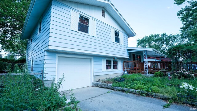 4409 Austin Dr, Fort Wayne, IN 46806 - view of front of house with an attached garage and driveway
