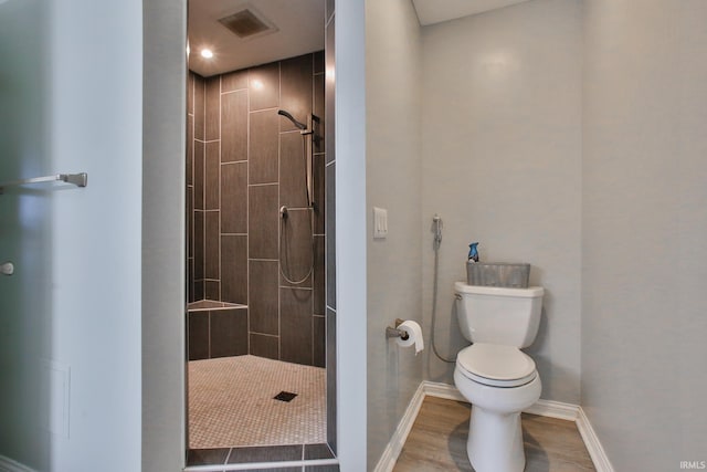 3517 Boulder Pass, Fort Wayne, IN 46818 - bathroom featuring a tile shower and wood finished floors