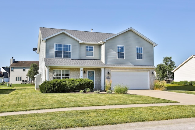 3517 Boulder Pass, Fort Wayne, IN 46818 - traditional home featuring an attached garage, concrete driveway, a shingled roof, a front yard, and brick siding