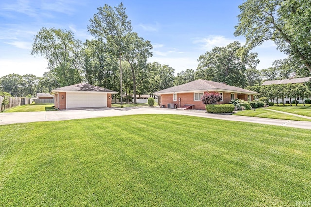 56928 County Road 13, Elkhart, IN 46516 - ranch-style home with a detached garage and brick siding