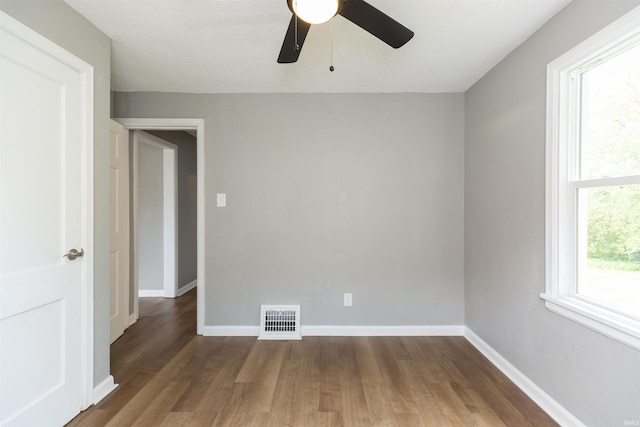 717 S Falcon St, South Bend, IN 46619 - spare room featuring wood finished floors and ceiling fan