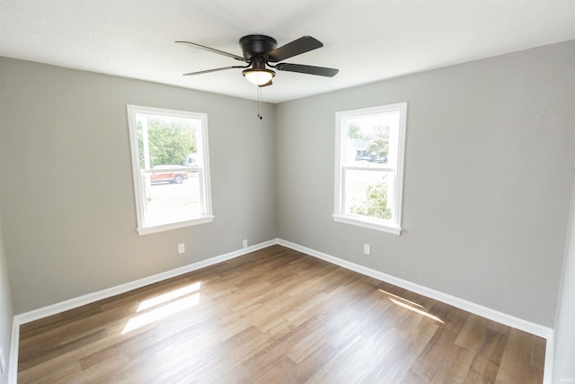 717 S Falcon St, South Bend, IN 46619 - spare room featuring a ceiling fan and wood finished floors