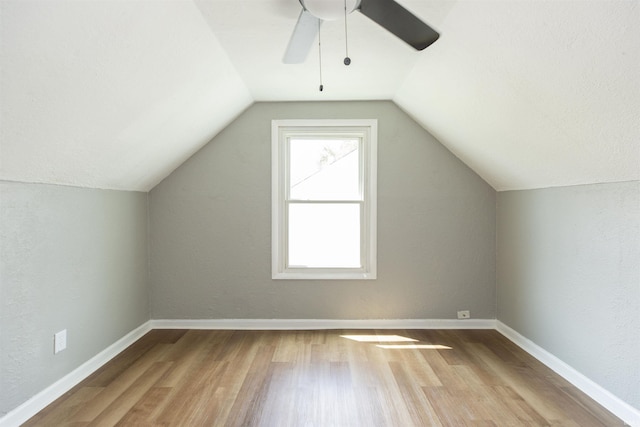717 S Falcon St, South Bend, IN 46619 - additional living space featuring a ceiling fan, wood finished floors, and vaulted ceiling