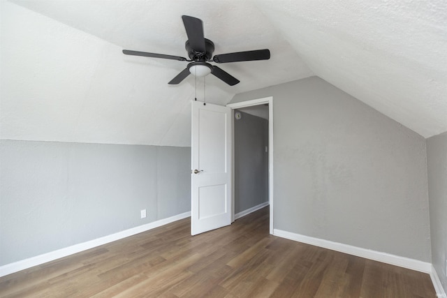 717 S Falcon St, South Bend, IN 46619 - bonus room featuring vaulted ceiling, wood finished floors, ceiling fan, and a textured ceiling