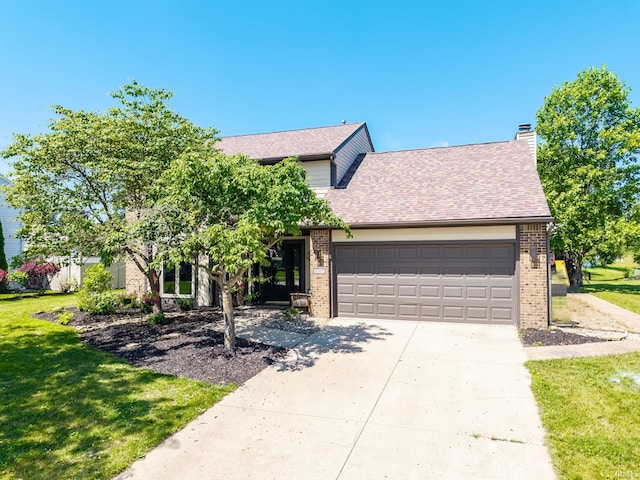 11215 Crested Oak Ct, Fort Wayne, IN 46845 - view of front of house with brick siding, a garage, concrete driveway, a front yard, and roof with shingles