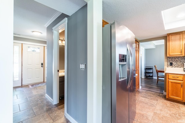 11215 Crested Oak Ct, Fort Wayne, IN 46845 - hallway featuring ornamental molding and a textured ceiling