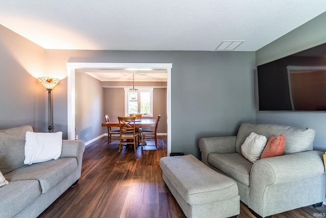 11215 Crested Oak Ct, Fort Wayne, IN 46845 - living room with dark wood-type flooring and baseboards