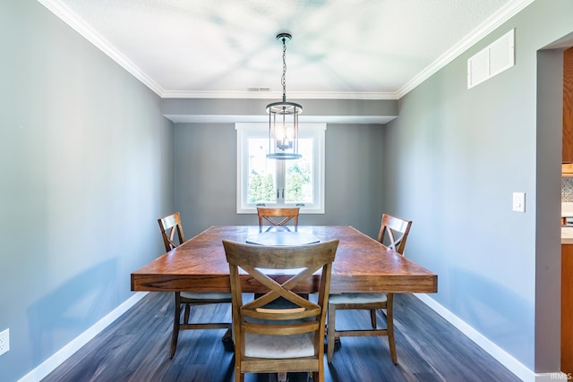 11215 Crested Oak Ct, Fort Wayne, IN 46845 - dining area featuring dark wood-style flooring and crown molding