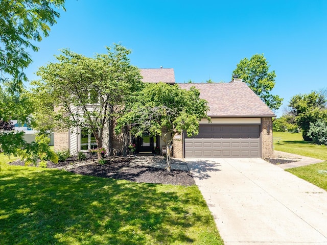11215 Crested Oak Ct, Fort Wayne, IN 46845 - view of front of home featuring brick siding, a garage, a front lawn, concrete driveway, and a shingled roof