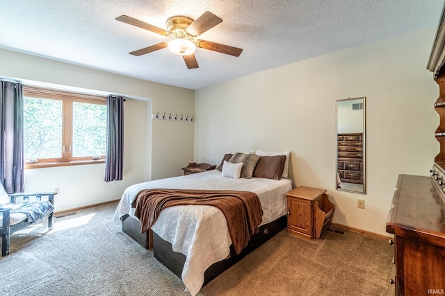 11215 Crested Oak Ct, Fort Wayne, IN 46845 - bedroom featuring carpet floors, a textured ceiling, and a ceiling fan