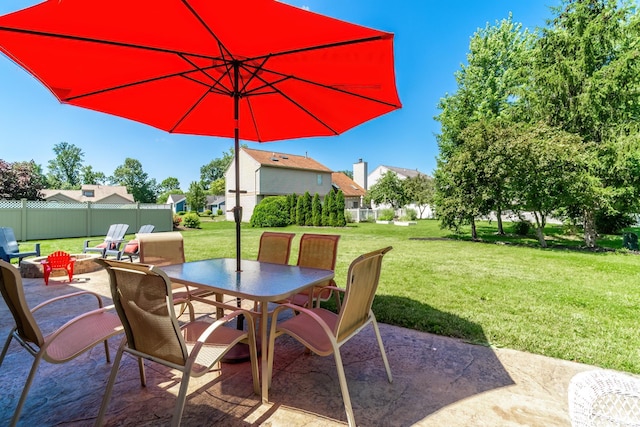 11215 Crested Oak Ct, Fort Wayne, IN 46845 - view of patio featuring outdoor dining space and an outdoor fire pit