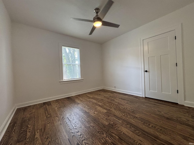 2521 N Red Bank Rd, Evansville, IN 47720 - unfurnished room featuring dark wood-style floors, a ceiling fan, and vaulted ceiling
