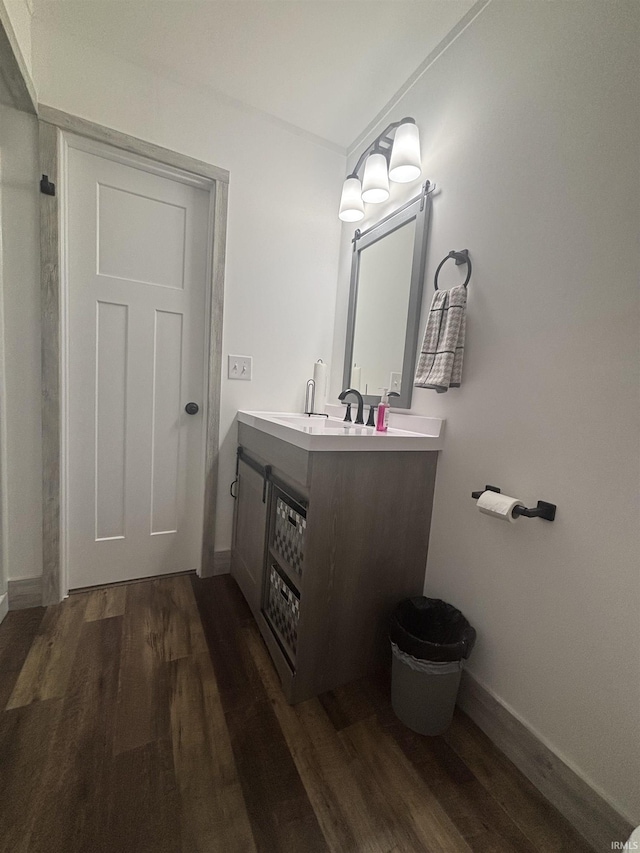 2521 N Red Bank Rd, Evansville, IN 47720 - bathroom featuring wood finished floors and vanity