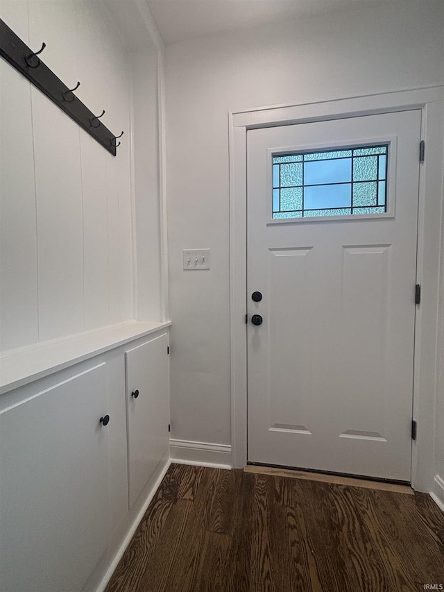 2521 N Red Bank Rd, Evansville, IN 47720 - doorway to outside with dark wood-style floors and baseboards